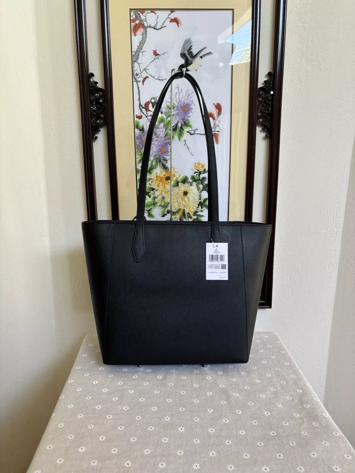 Bolsa Kate Spade DANA SAFFIANO PVC TOTE - NEGRO FLOR BLANCA