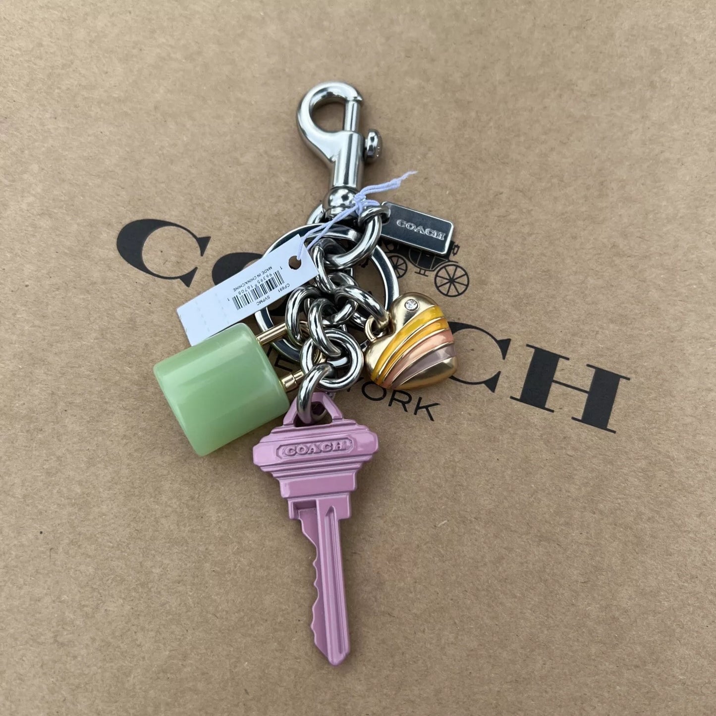 Llavero Coach key cluster bag charm