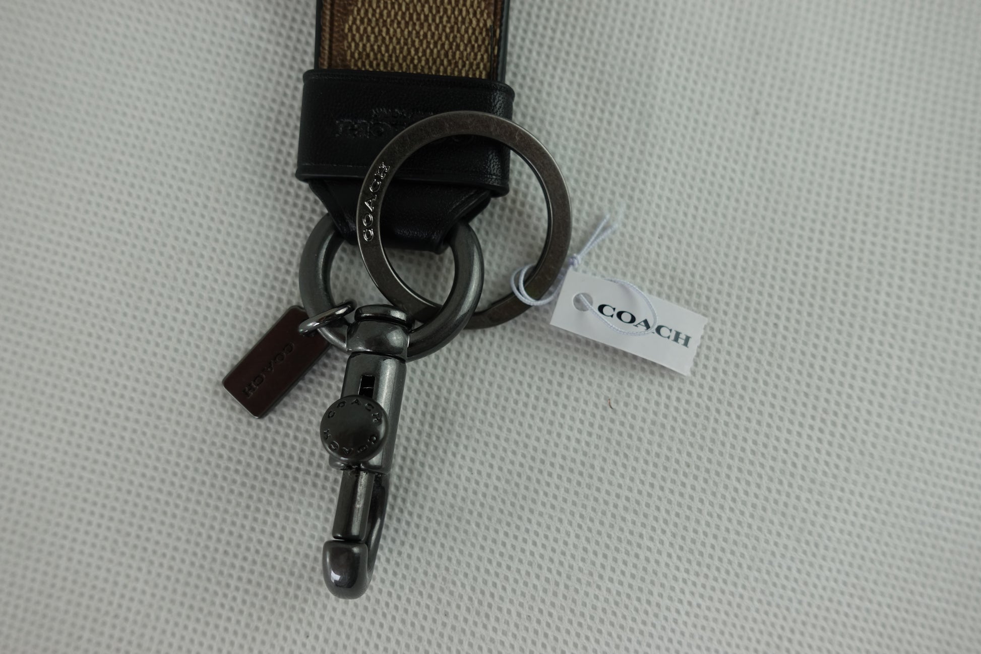 large loop key fob in signature canvas coach｜TikTok Search