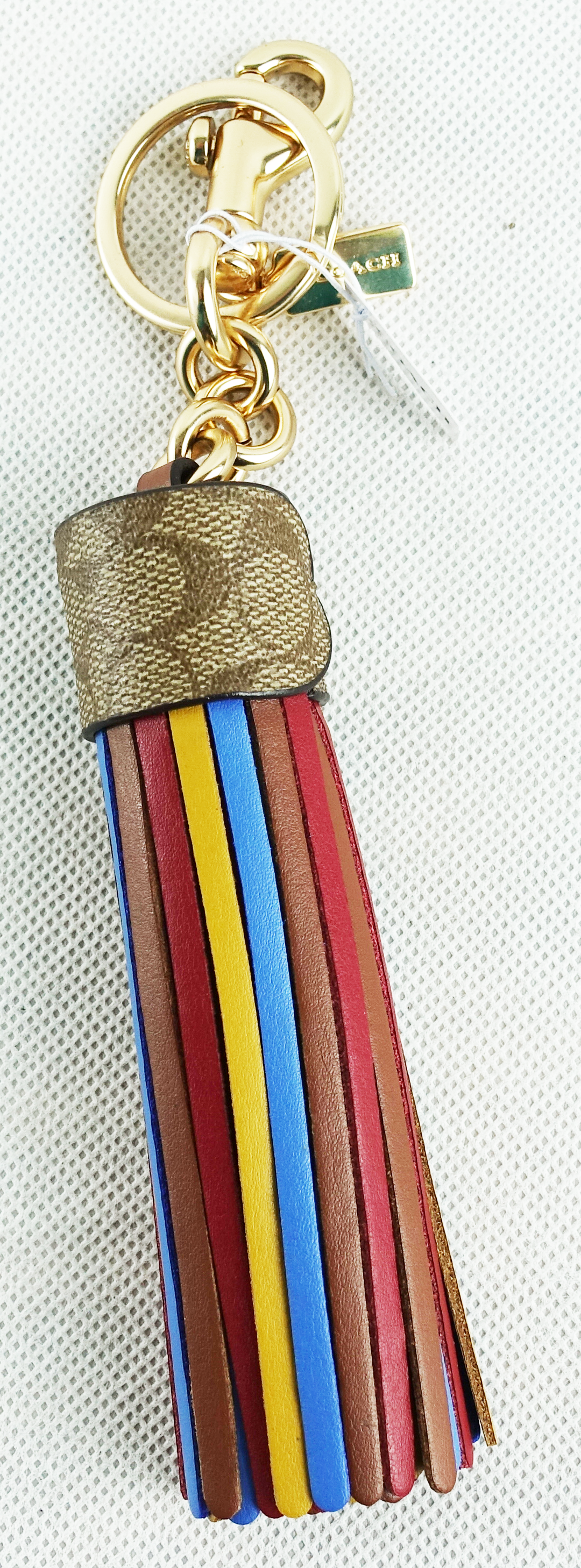 Coach tassel 2025 bag charm